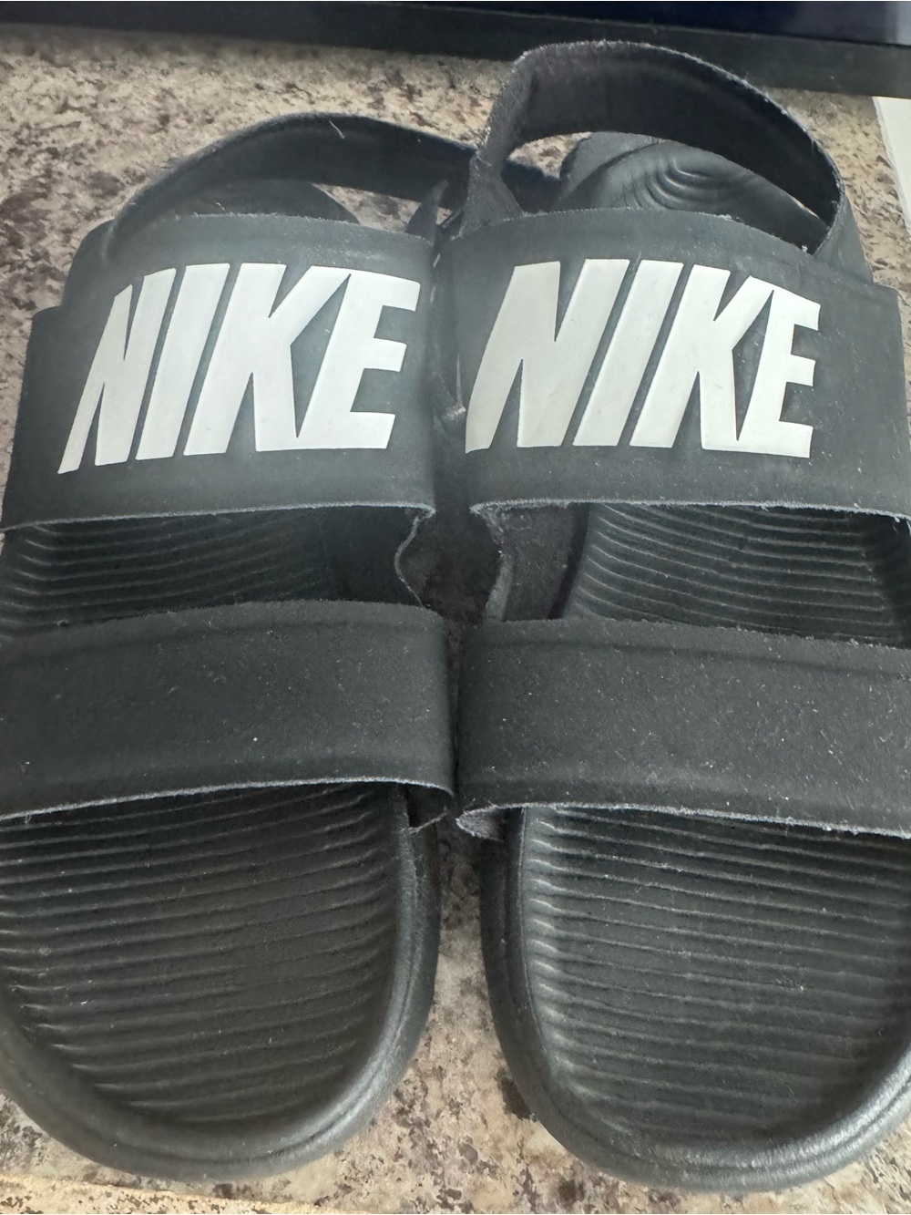 Nike women Black Slides with White NIKE Logo